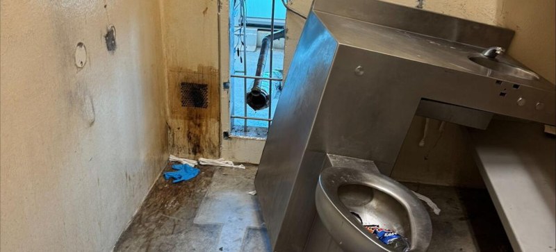 The gap behind a removed toilet at the Orleans Justice Center that 10 inmates crawled through during the May 2025 escape